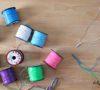 Bring Back the 90s with a Party Lanyard Station! The lanyard craft we loved as kids will keep older kids busy at your Chanukah party