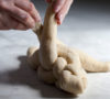 Watch and learn how to braid a 4 strand challah, bakery style. Tips on how to braid beautiful challha loaves, every time: