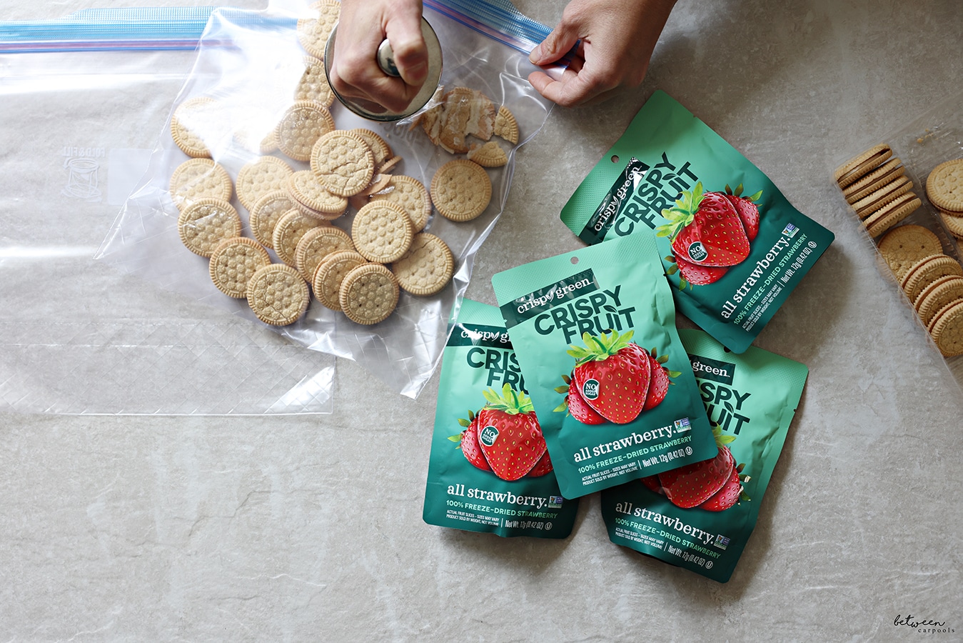 Putting vanilla sandwich cookies into a Ziploc bag