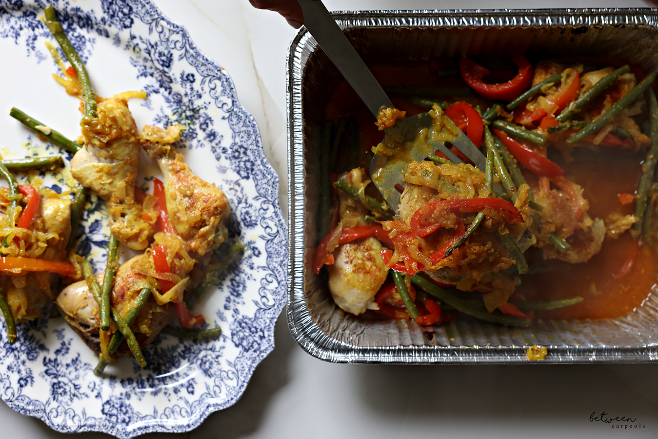 Chicken With Green Beans and Roasted Peppers, some in a 9 x 13 aluminum pan and some on a platter.