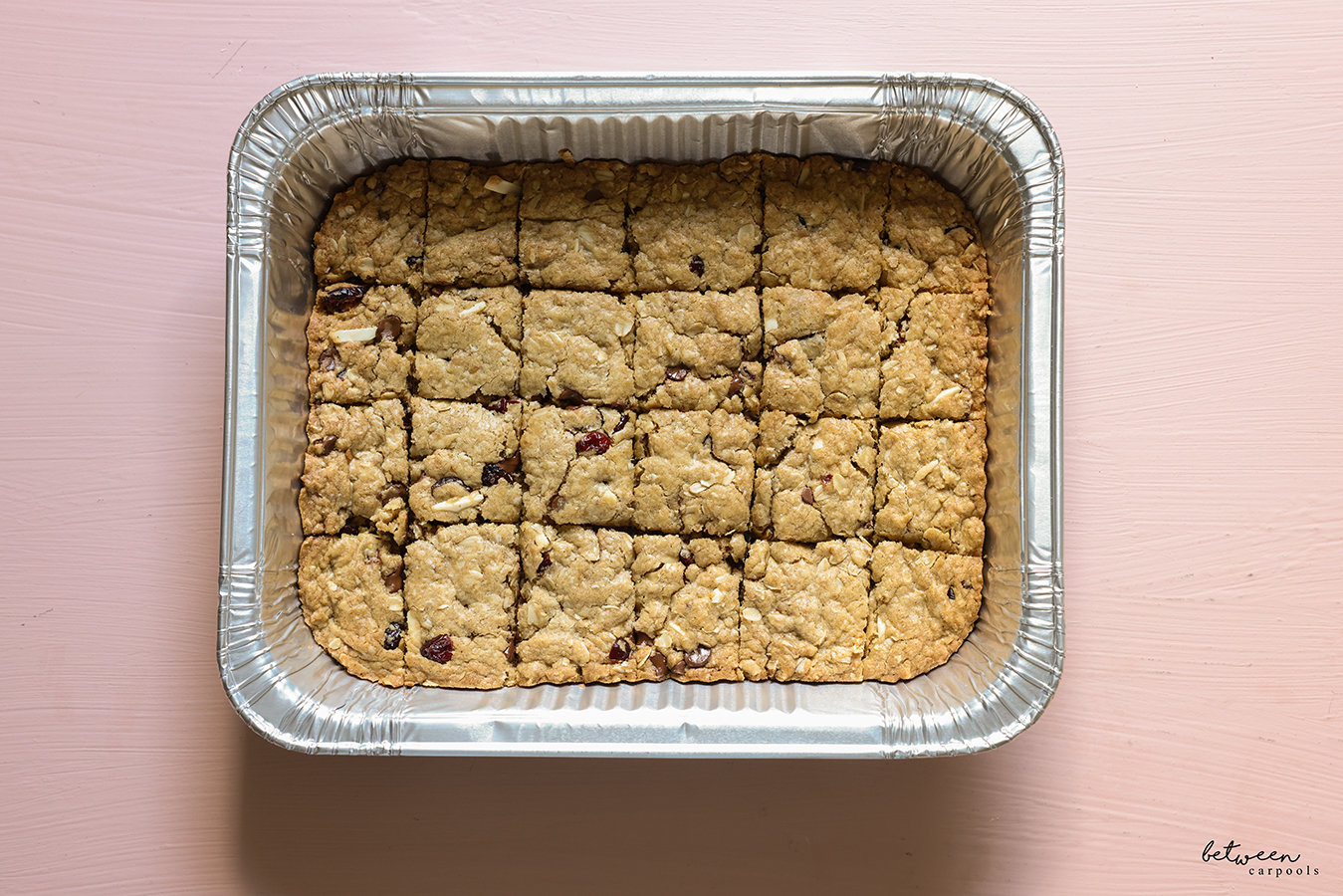Baked lactation cookies in a 9 x 13-inch baking pan, cut into squares.