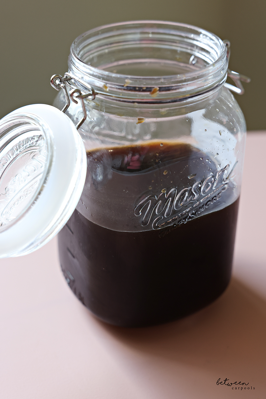 Cold brew in a wide-mouth glass jar.