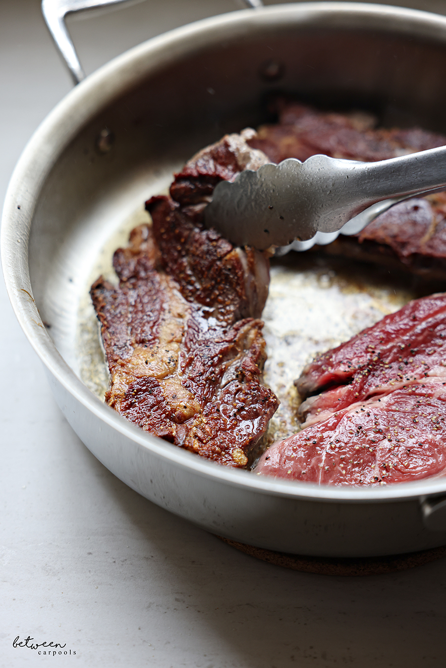 Searing seasoned boneless flanken.