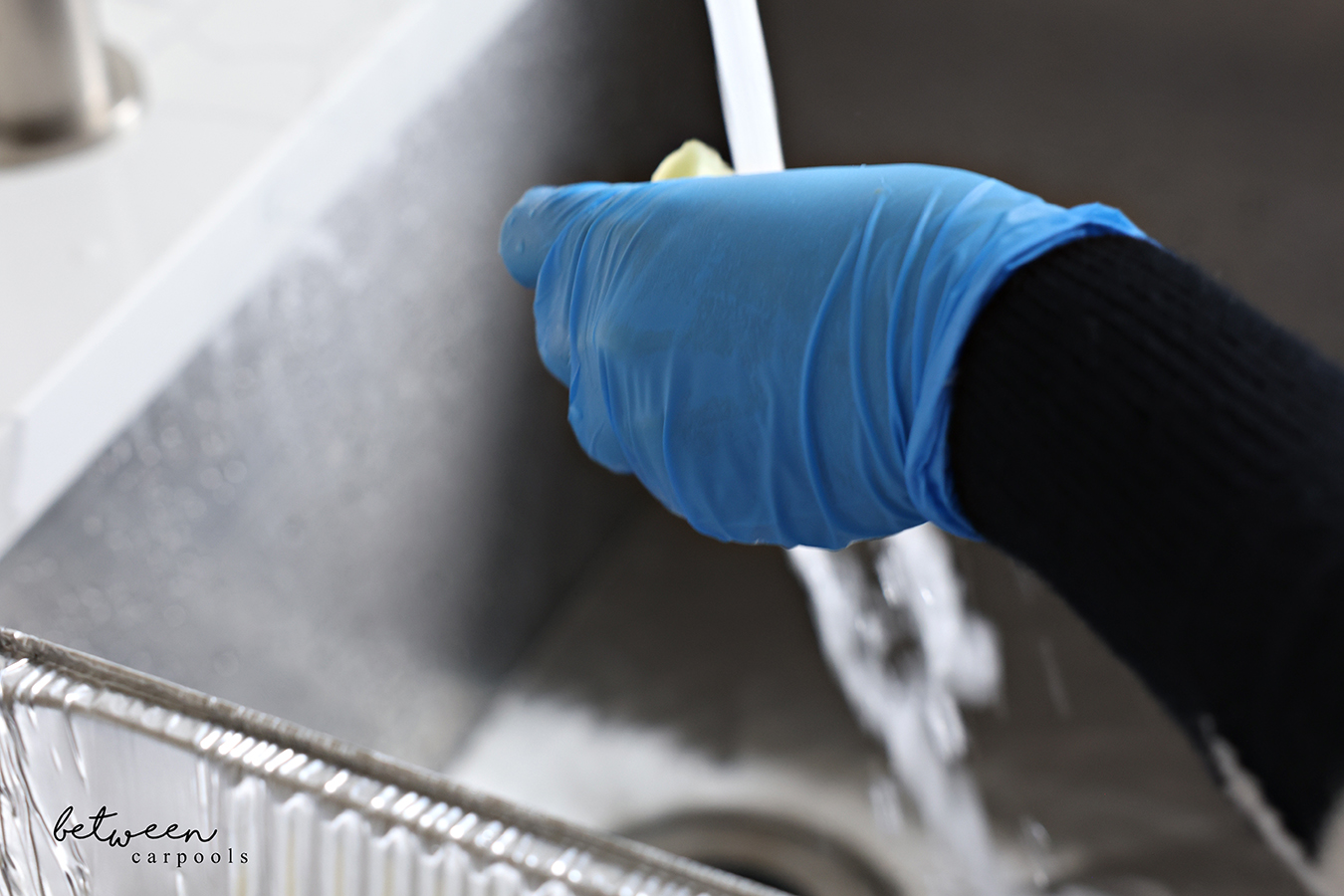 Rinsing chopped apples.